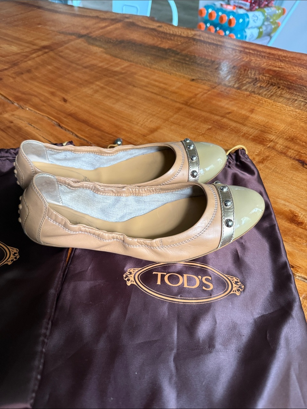 Tod's Nude Leather Cap-Toe Ballet Flats with Gold-Stud Accents. Bags included.